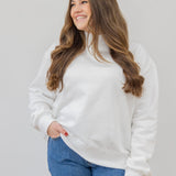 model in l/xl marshmallow mock neck