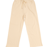 cream sweatpants flat lay