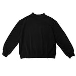 black mock neck flat lay