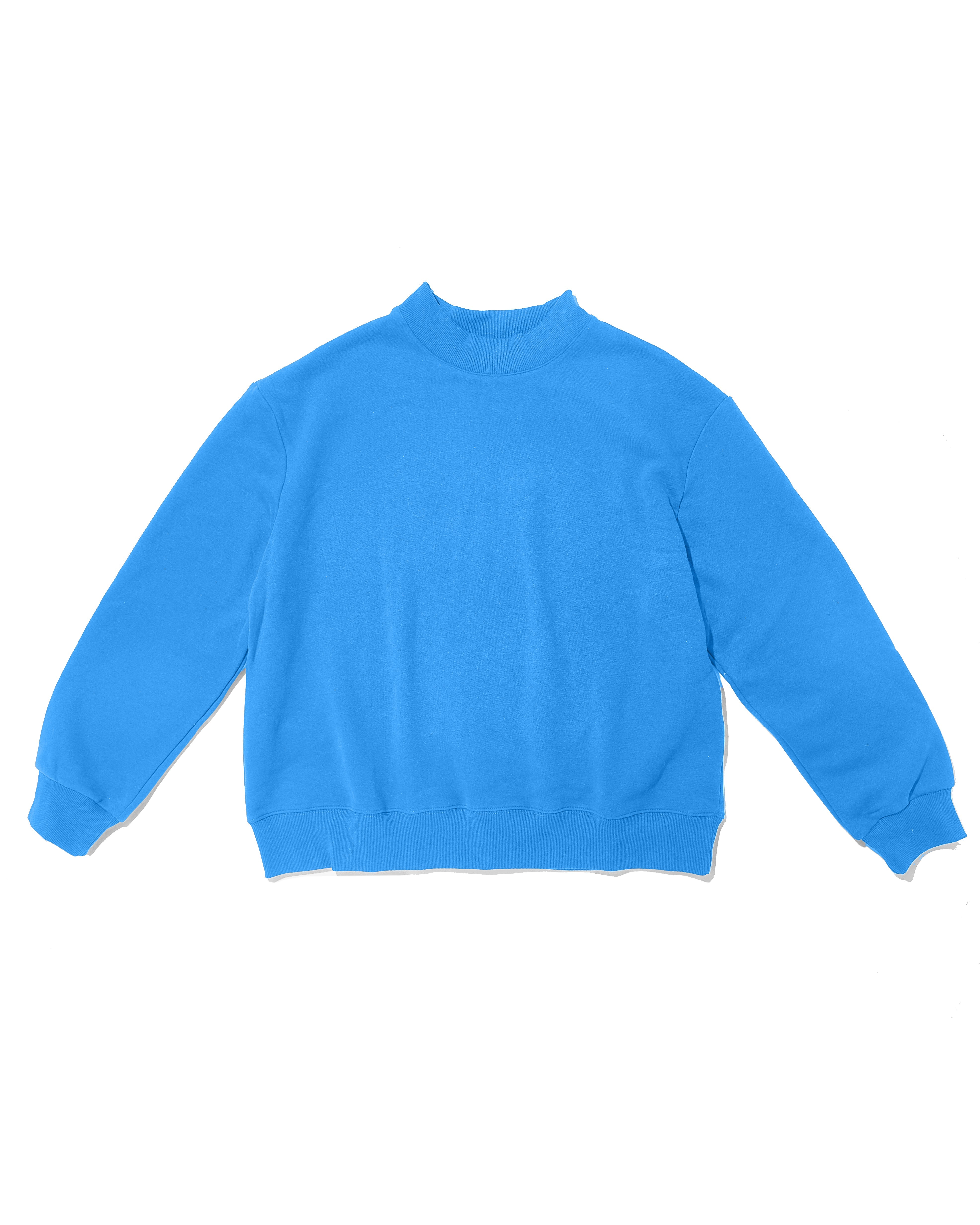blue mock neck flat lay