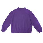 purple mock neck flat lay