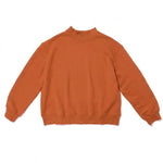 pumpkin mock neck flat lay
