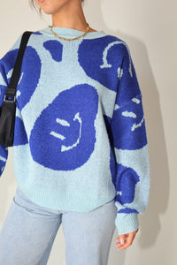 Blue Smiley Face Sweater