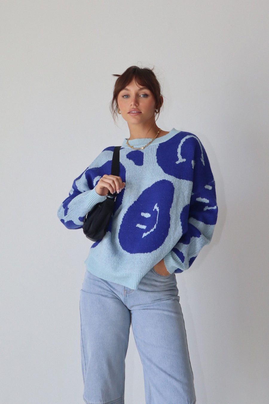 Blue Smiley Face Sweater